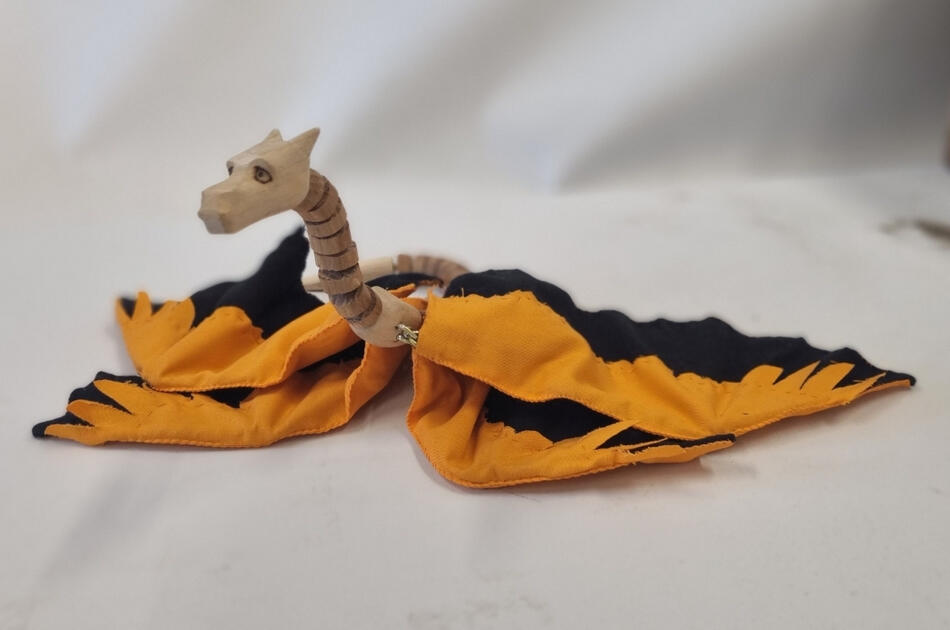 A wood, wire and fabric dragon.